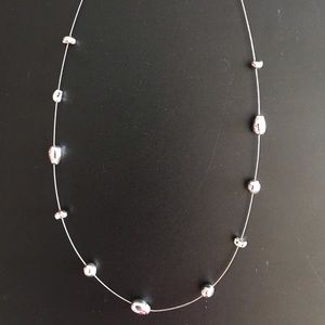 SILVER-TONE NECKLACE WITH ORGANIC STONE SHAPES